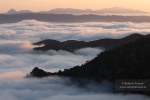 Mar de nubes al atardecer